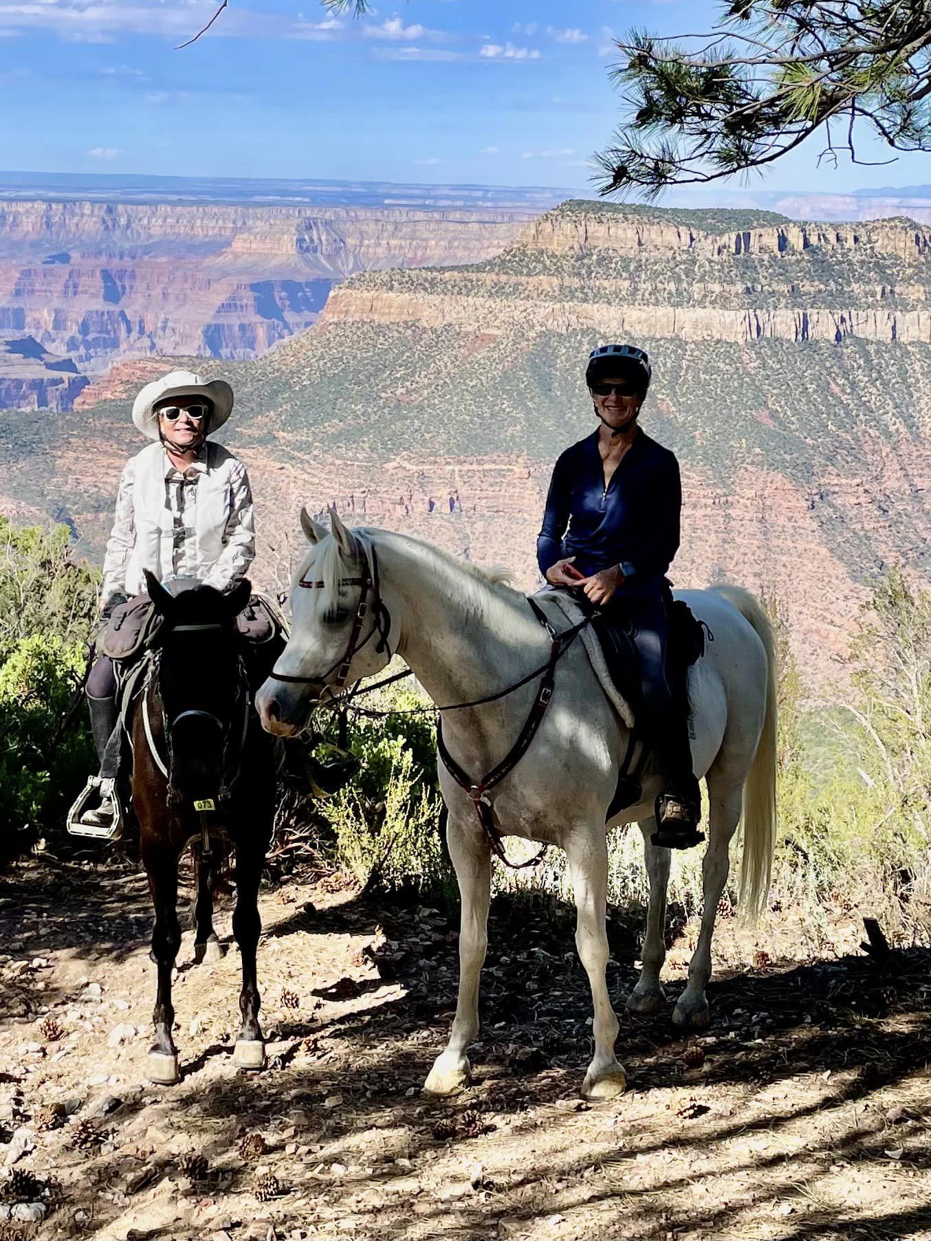 2 people on horseback grand canyon