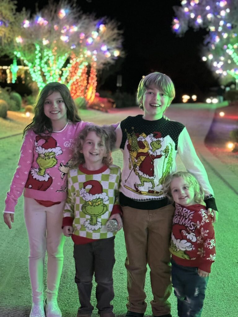 kids in grinch Christmas shirts 